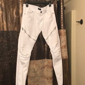 All white pants with zippers
